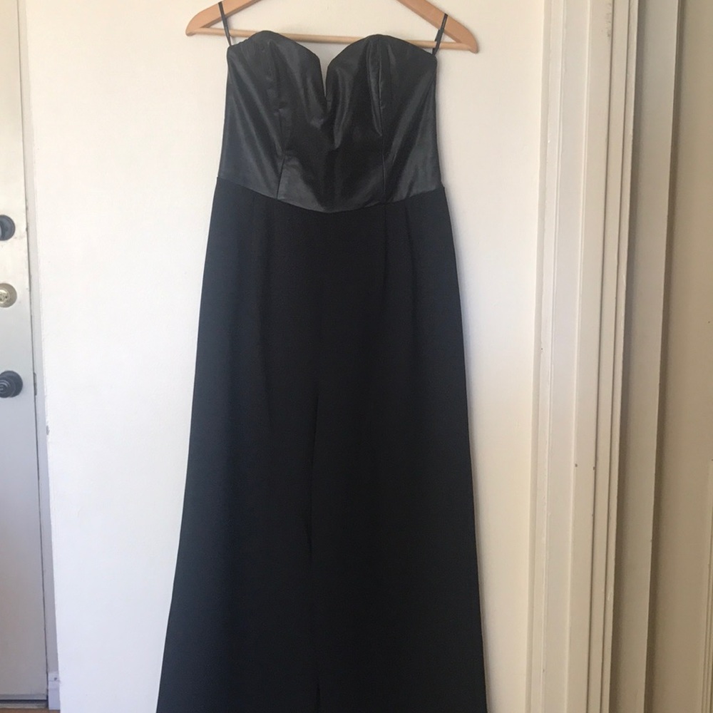 Black jumpsuit with leather on top